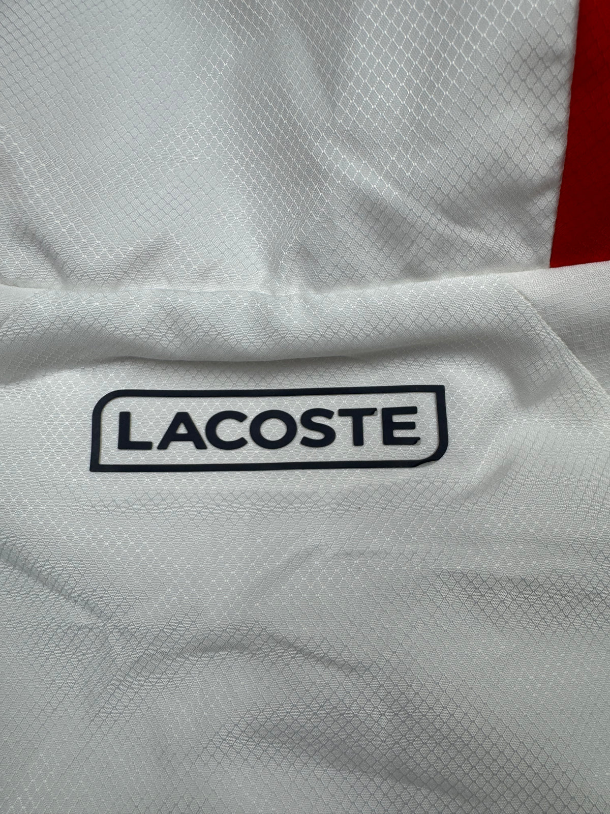 white Lacoste windbreaker {S}