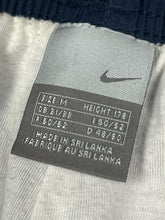 Load image into Gallery viewer, vintage Nike trackpants {M}
