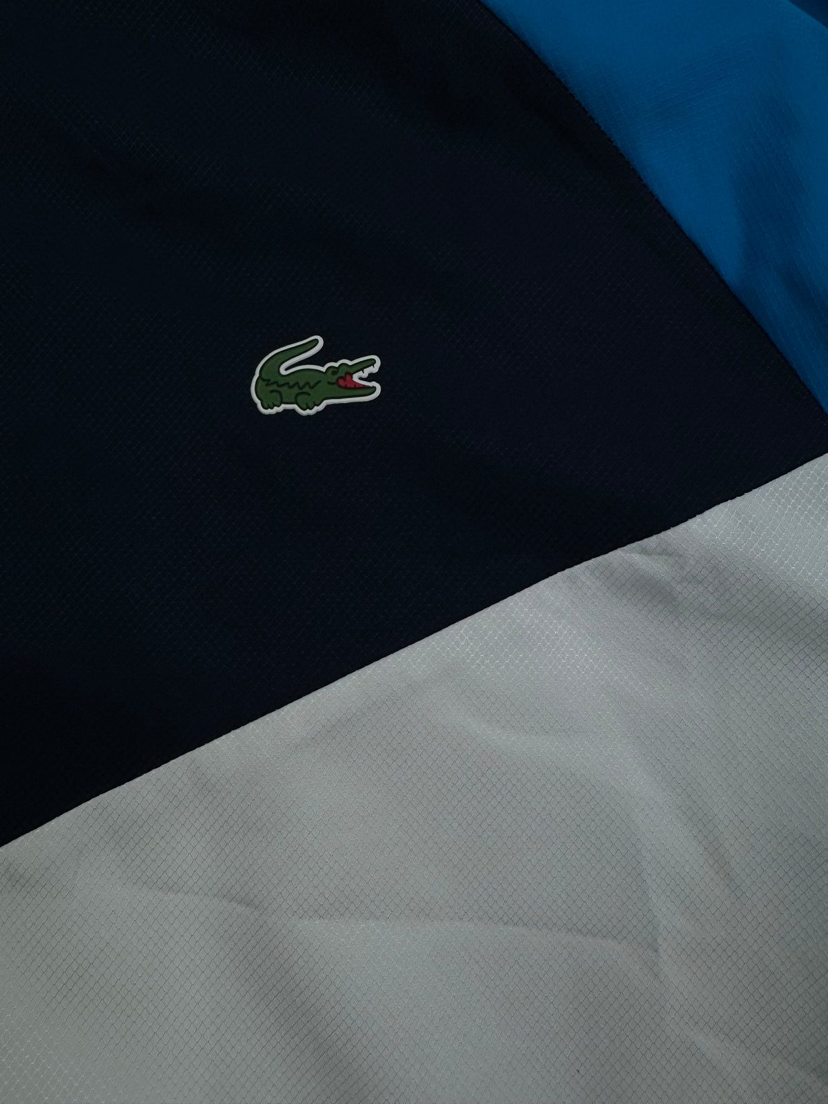 blue Lacoste windbreaker {XL}