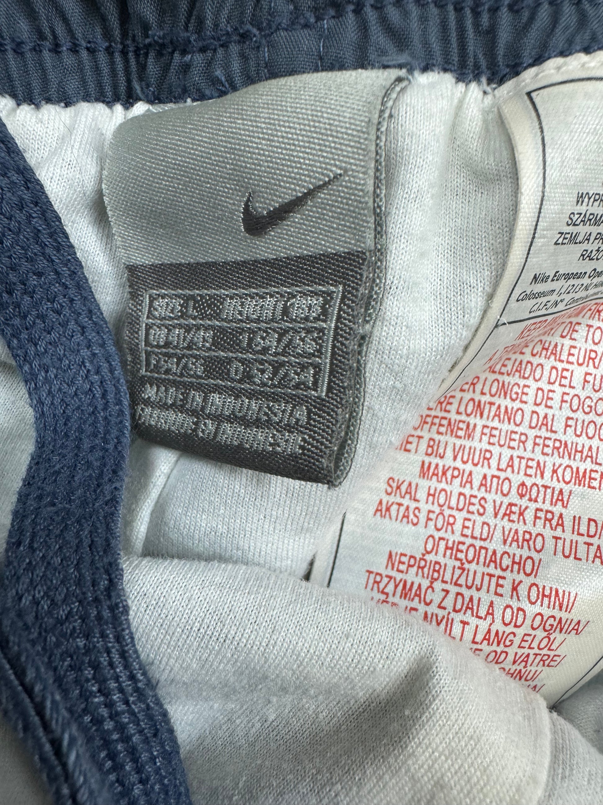 vintage Nike trackpants {L}
