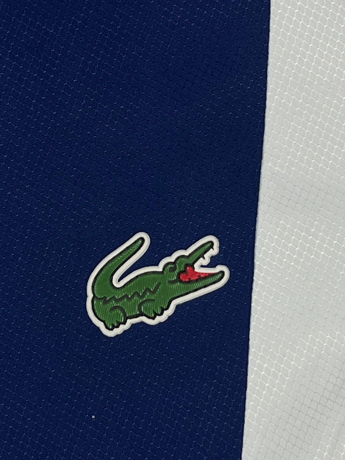 navyblue Lacoste windbreaker {S}