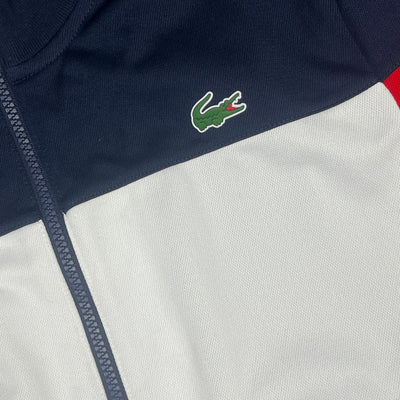red Lacoste trackjacket {M}
