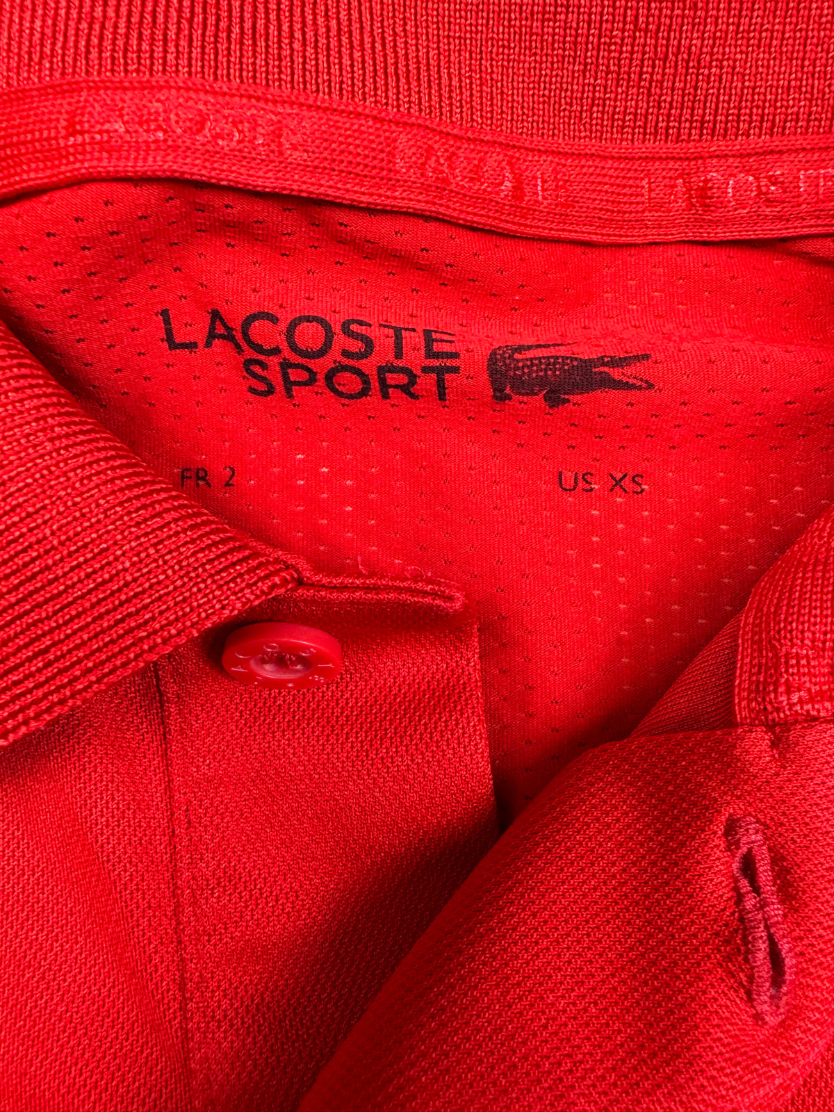 red Lacoste polo {XS}