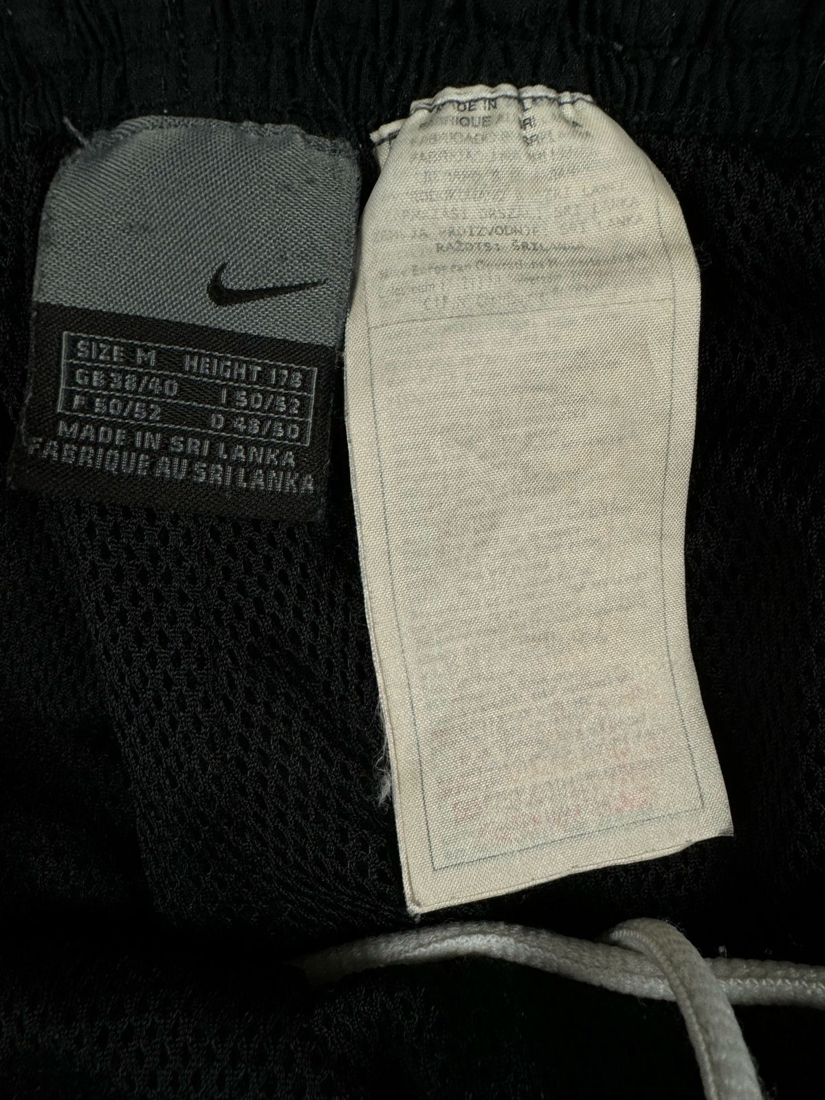 vintage black Nike trackpants {M}