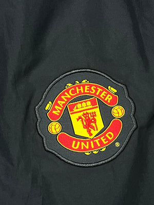 vintage Nike Manchester United trackpants {XL}