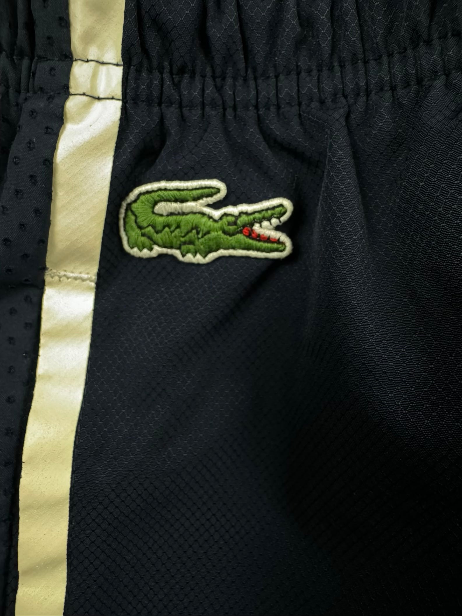 vintage Lacoste trackpants {S}