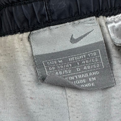 vintage Nike trackpants {M}