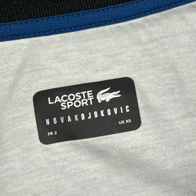 navyblue Lacoste windbreaker {S}