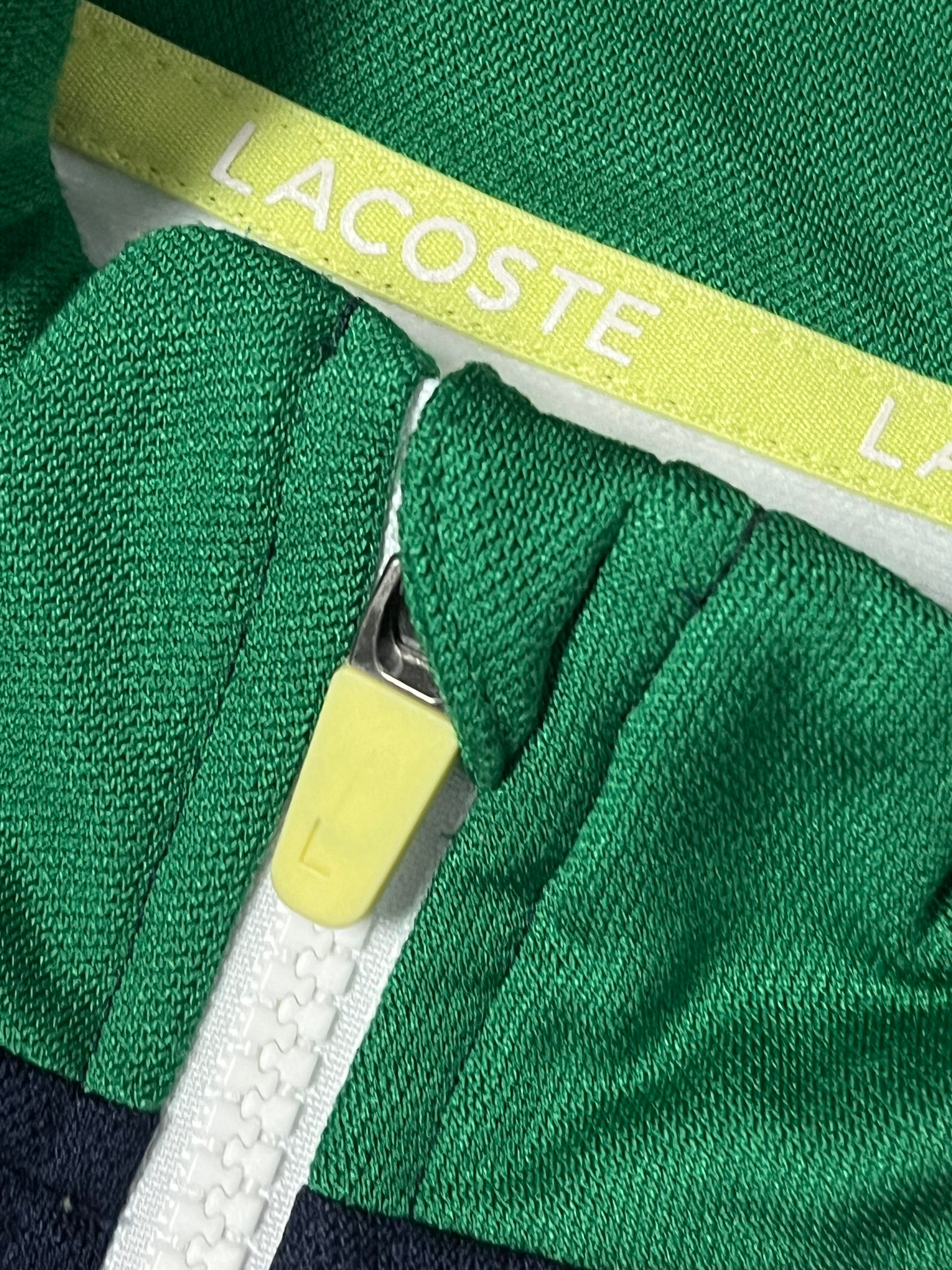 white Lacoste sweatjacket {S}