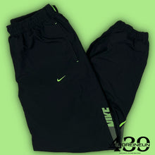 Load image into Gallery viewer, vintage Nike trackpants {S}
