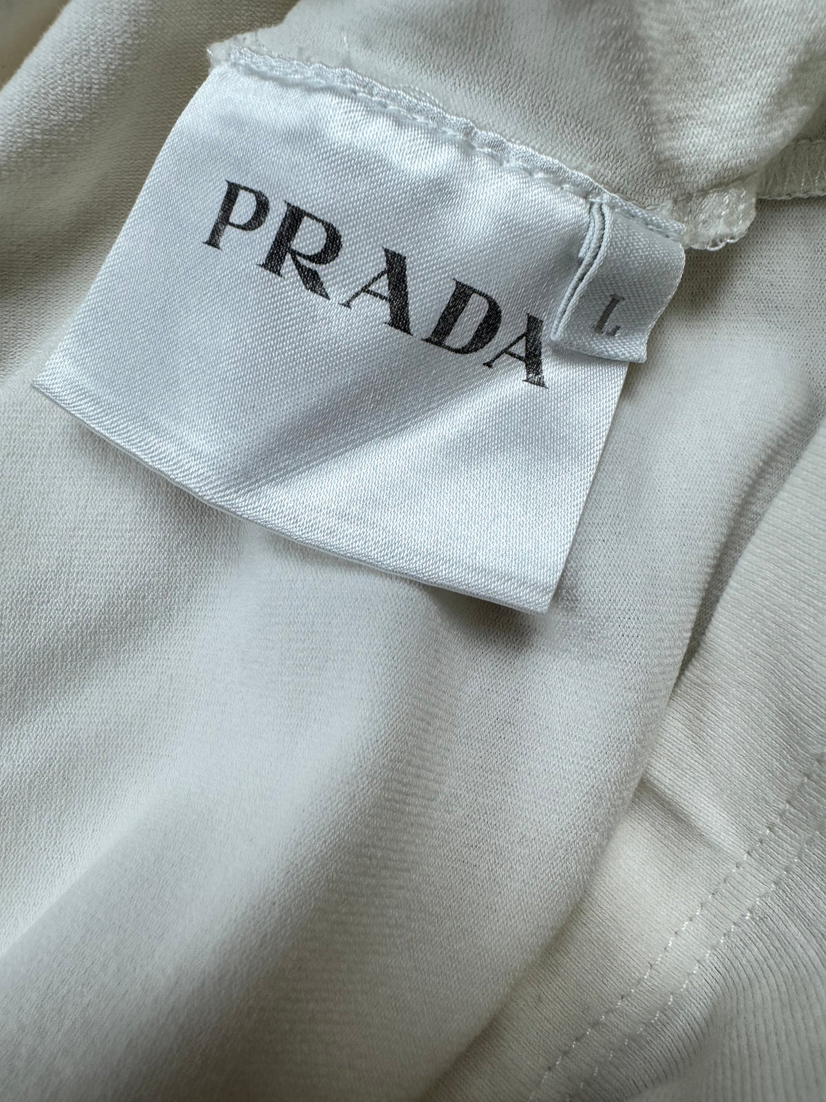 white Prada polo {L}