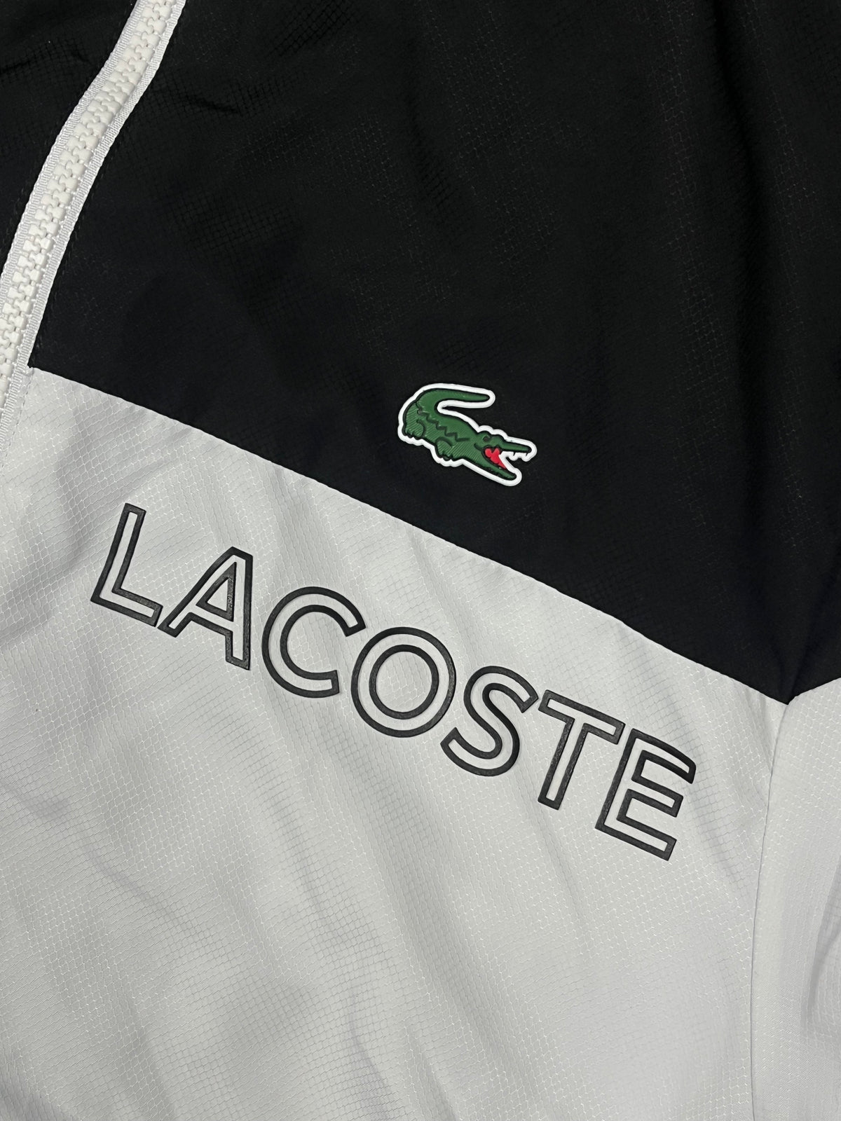 black/white Lacoste windbreaker {XS}