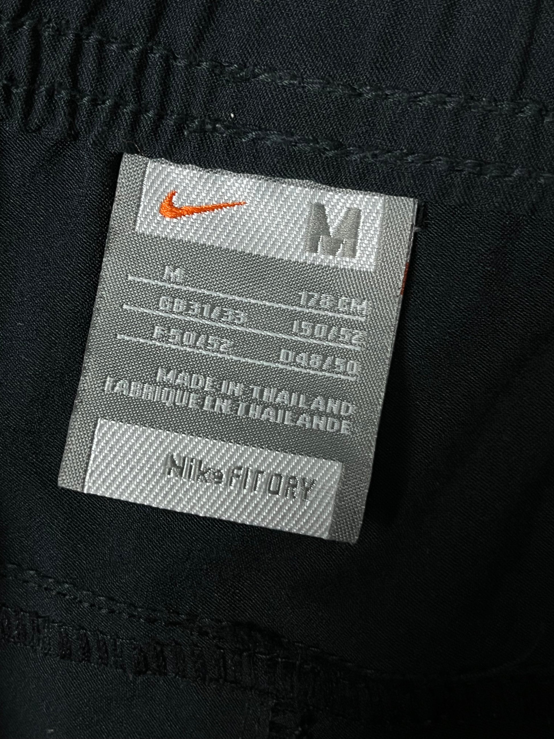 vintage Nike trackpants {M}