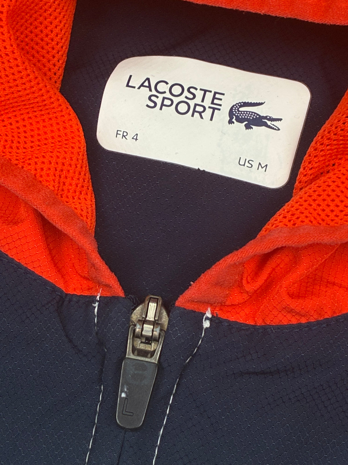 white Lacoste windbreaker {M}