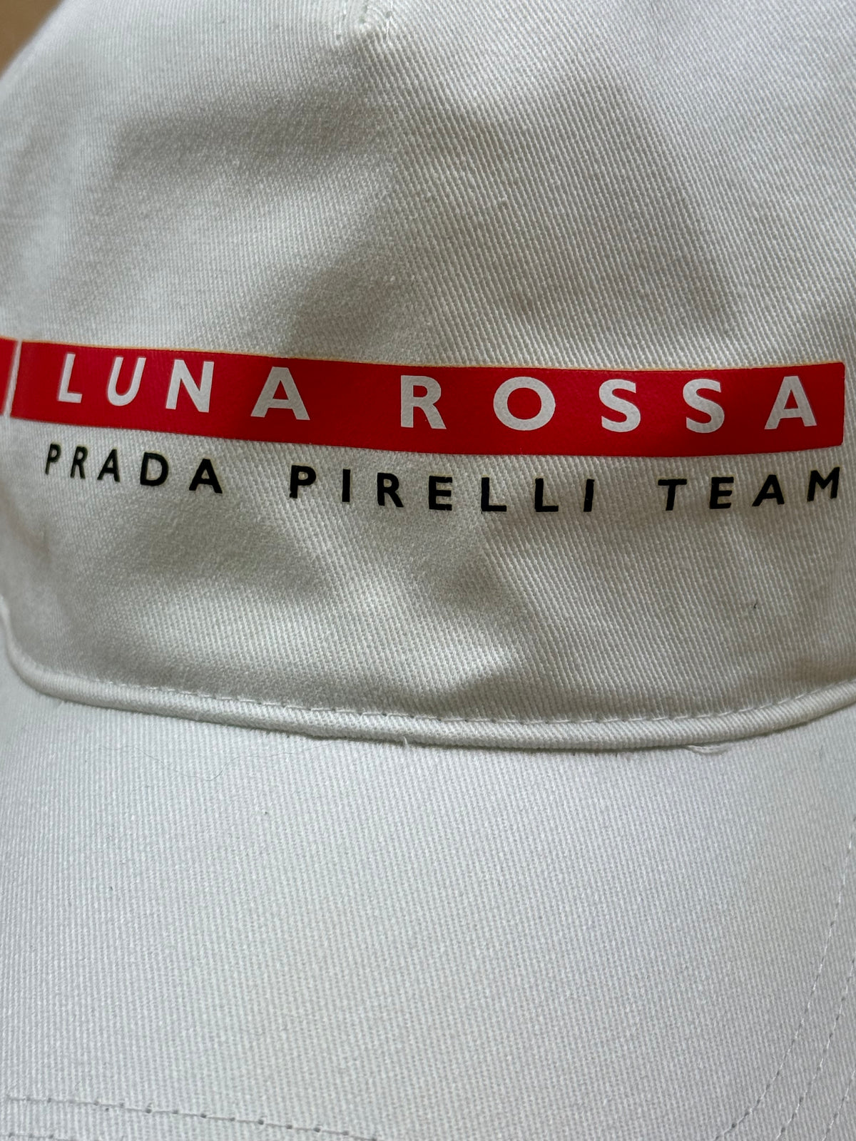 white Prada Luna Rossa cap