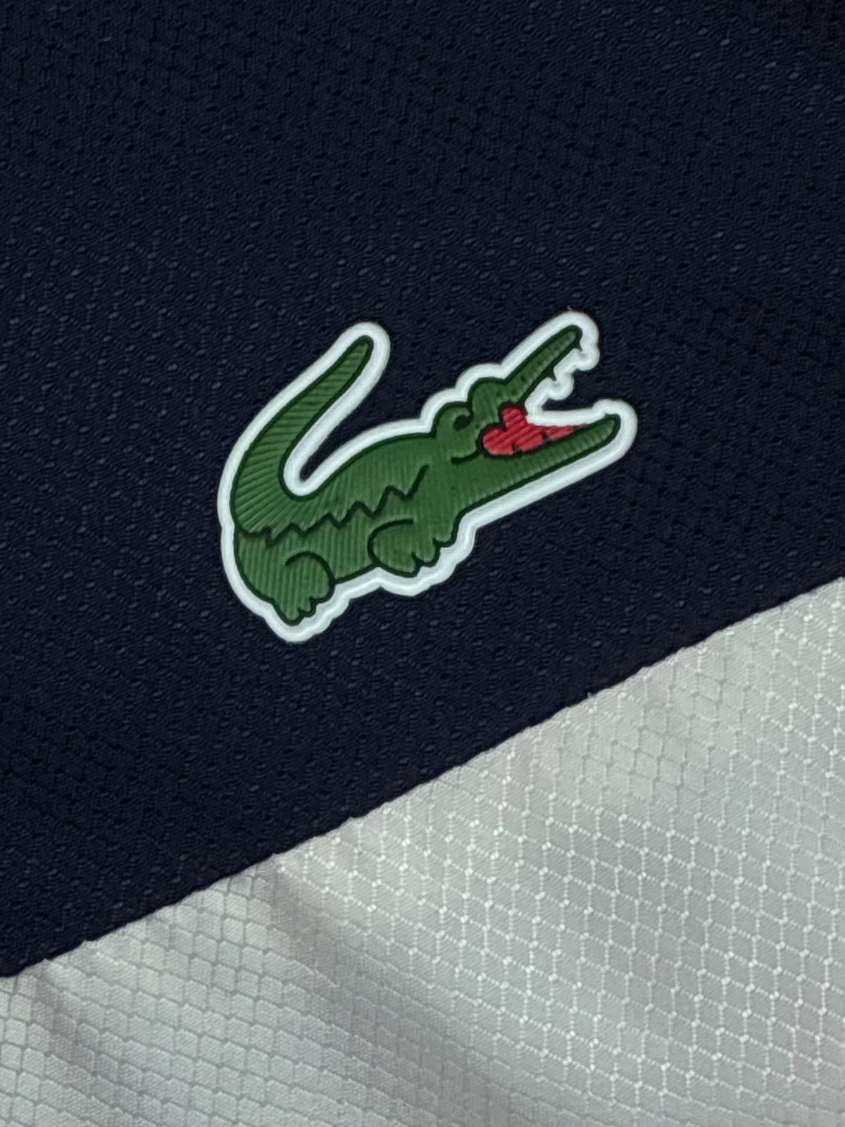 navyblue Lacoste windbreaker {S}