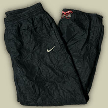 Carregar imagem no visualizador da galeria, vintage Nike trackpants {L}
