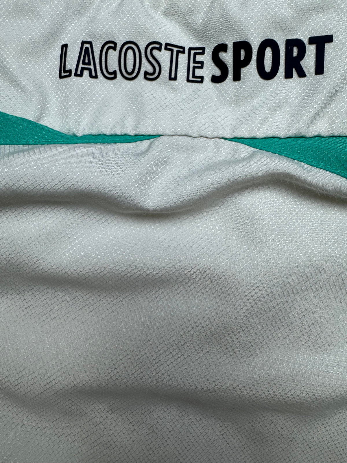 white Lacoste windbreaker {L}