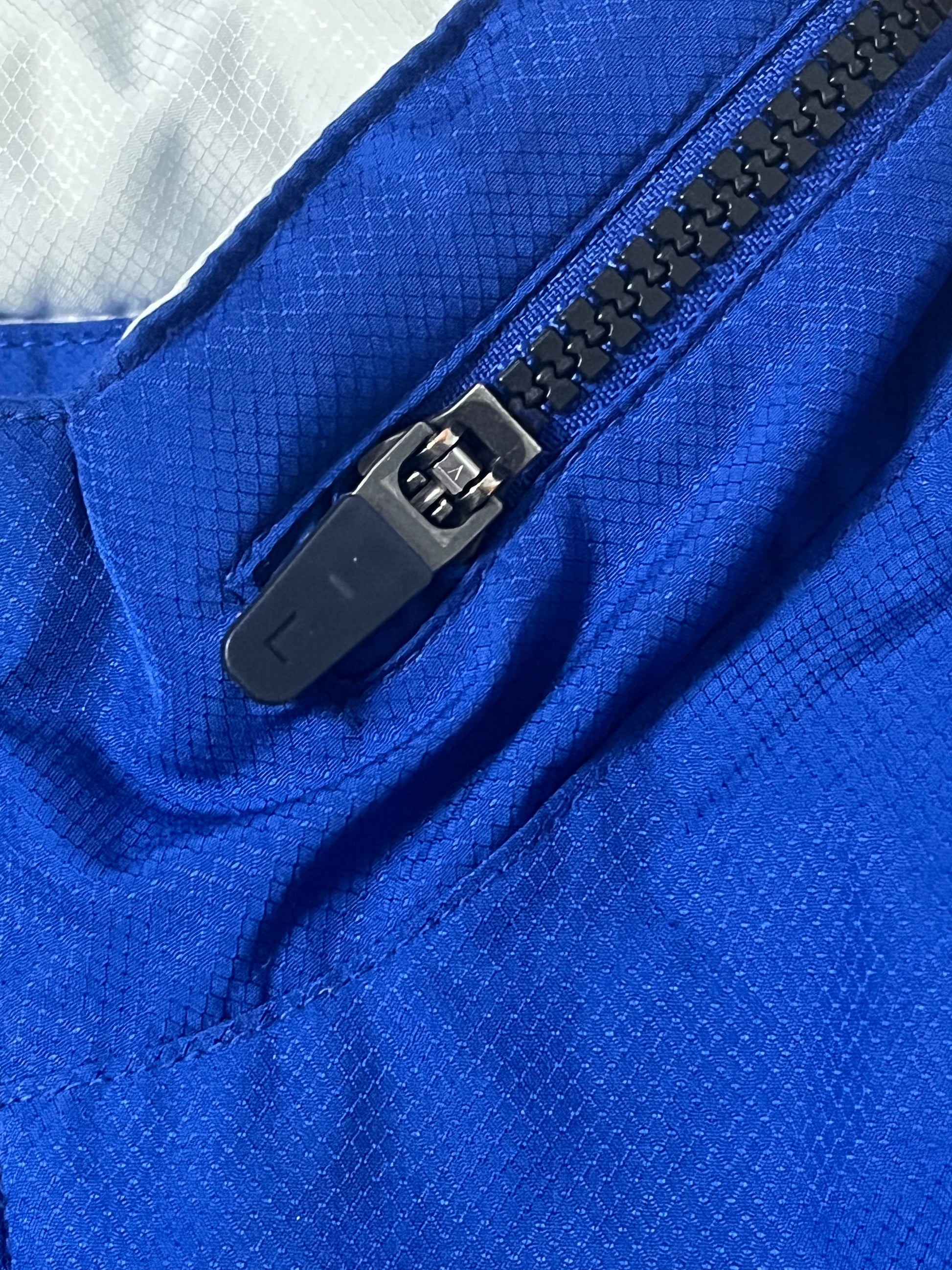 blue Lacoste windbreaker {M}