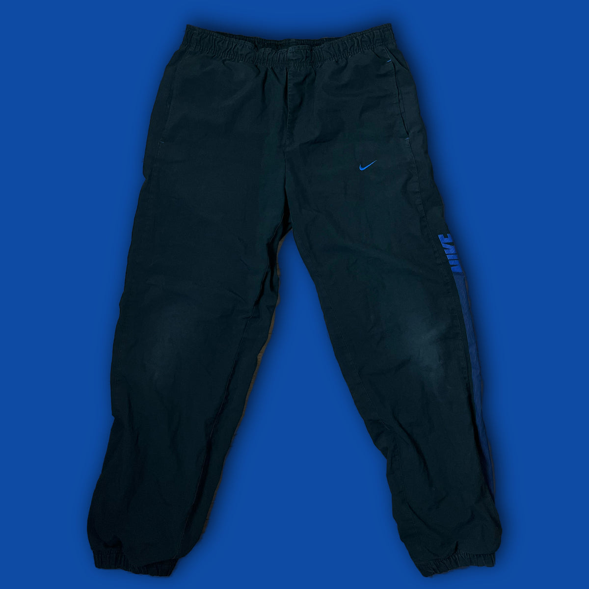 vintage Nike trackpants {M}