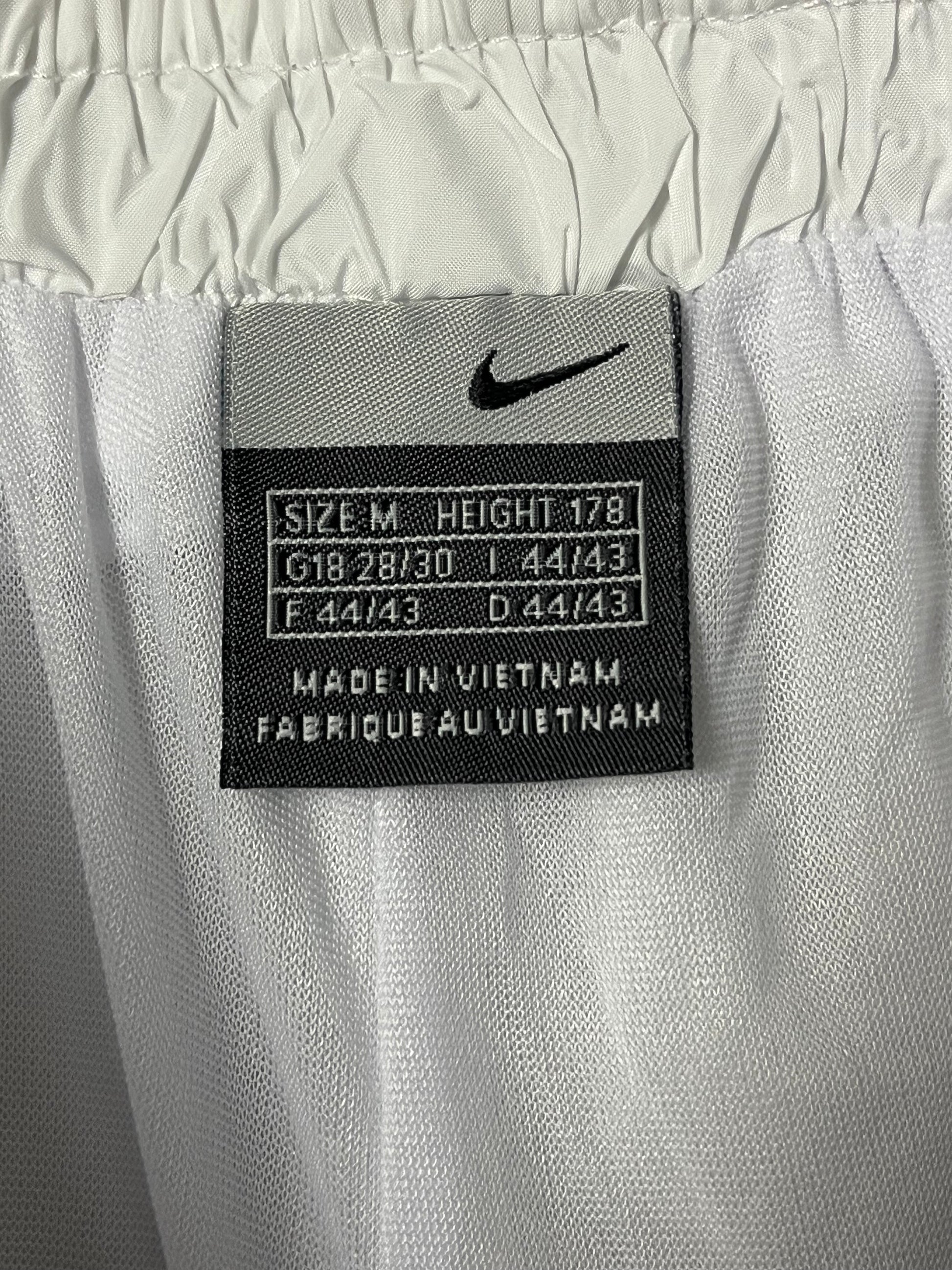 vintage Nike trackpants white {M}