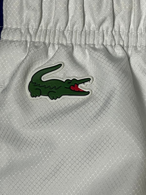 white Lacoste trackpants {XL}