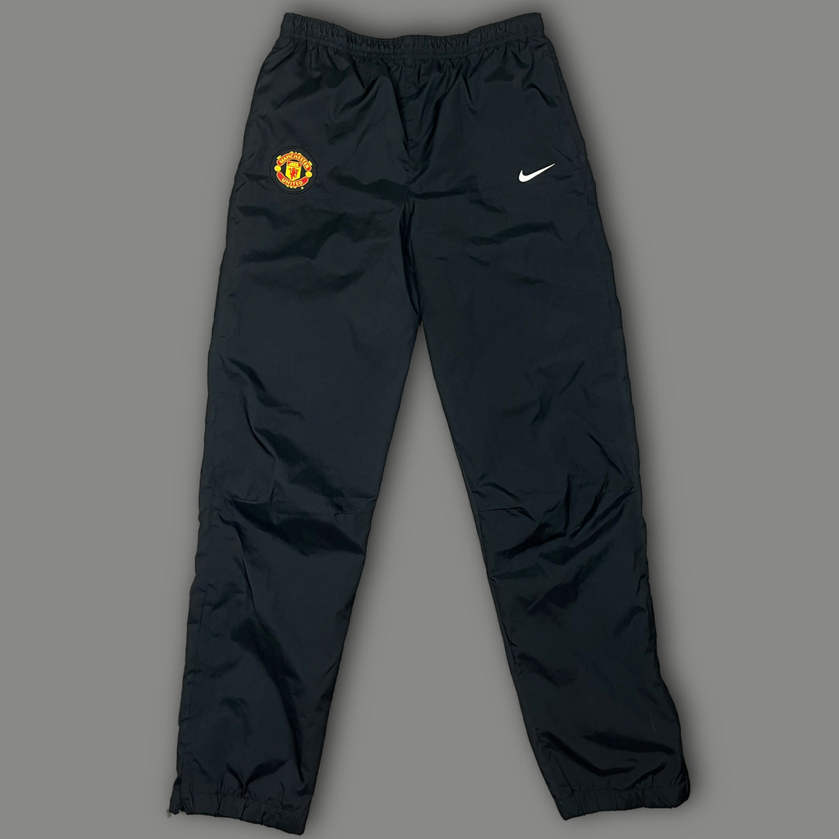 vintage Nike Manchester United trackpants {S}