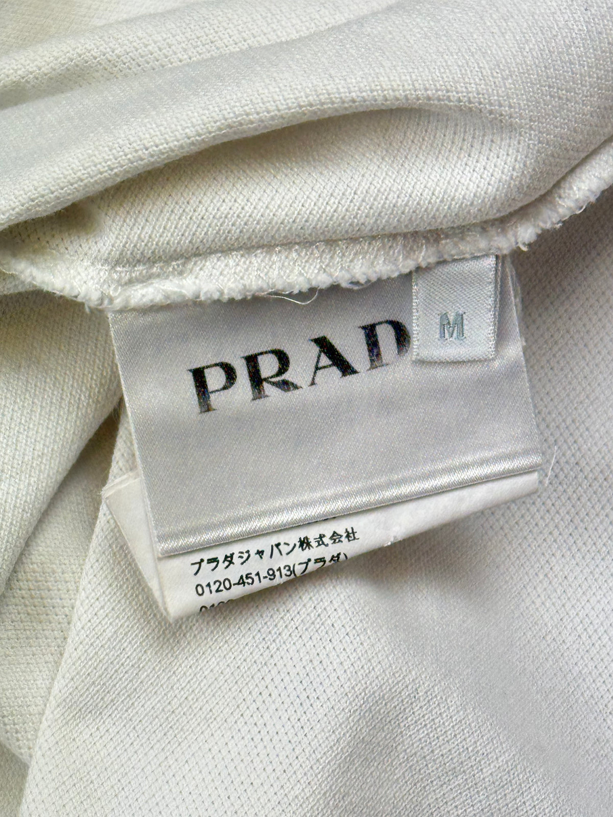white Prada polo {M}