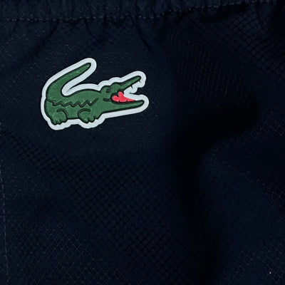 navyblue Lacoste trackpants {S}