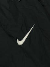 Load image into Gallery viewer, vintage Nike trackpants {XL}
