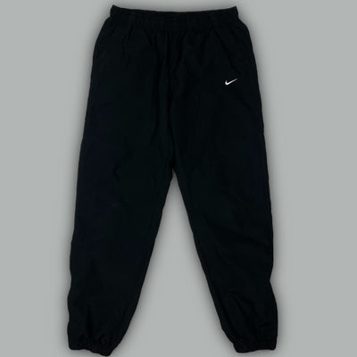 vintage Nike trackpants {M}