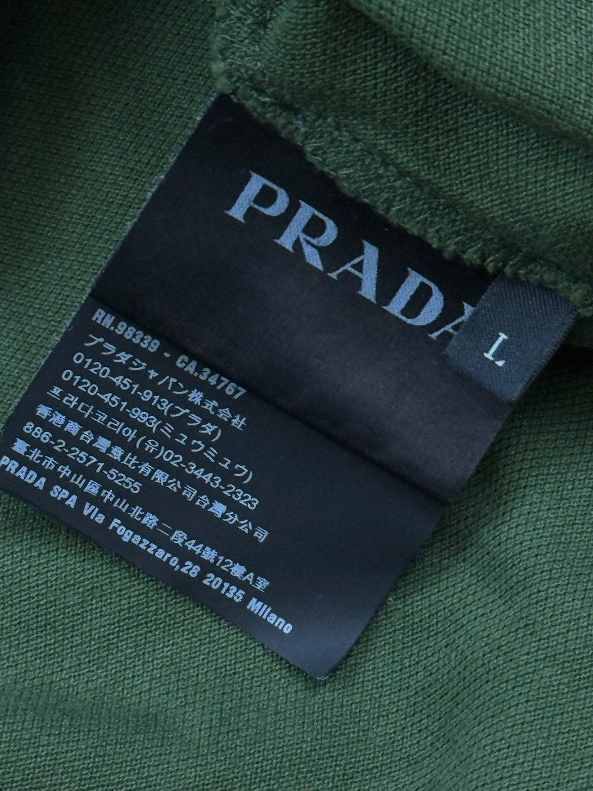 dark green Prada polo
