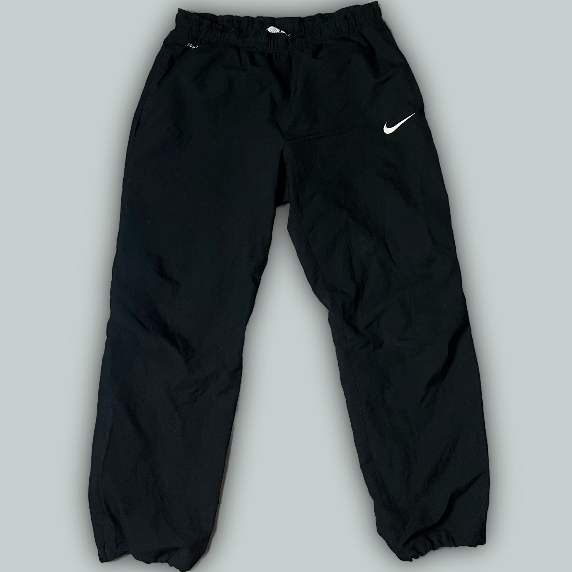 vintage Nike trackpants {L}