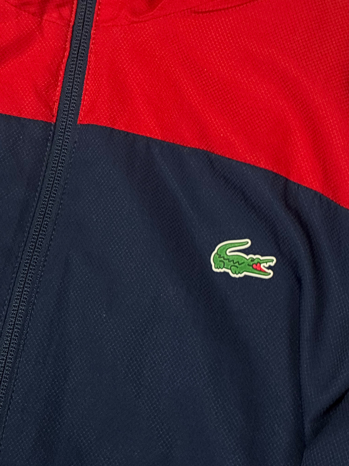 red Lacoste windbreaker {S}