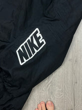 Load image into Gallery viewer, vintage Nike trackpants {S}
