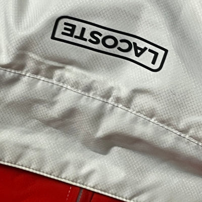 red/white Lacoste windbreaker {S}