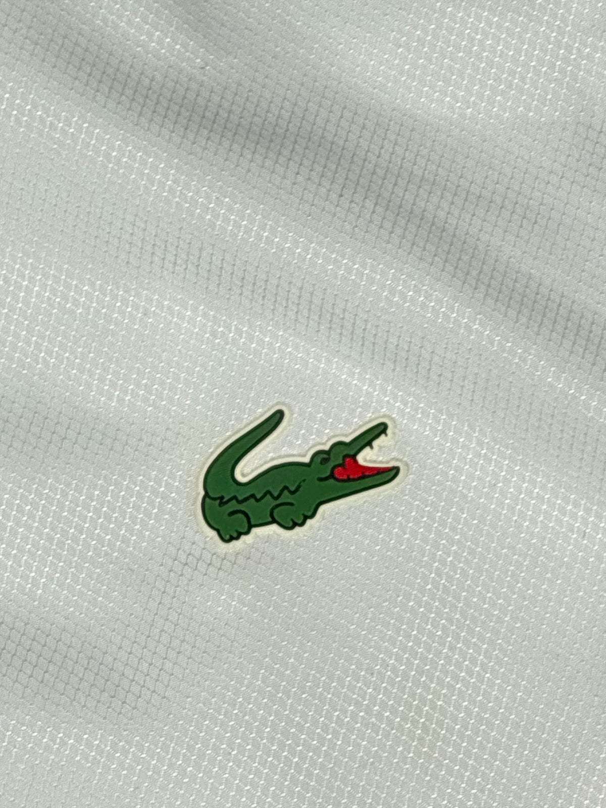 white Lacoste windbreaker {S}