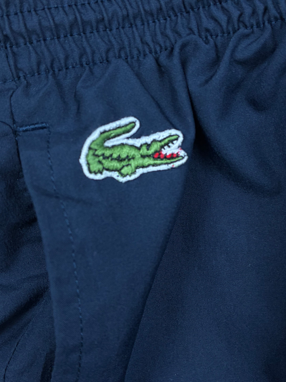 vintage Lacoste trackpants {M}
