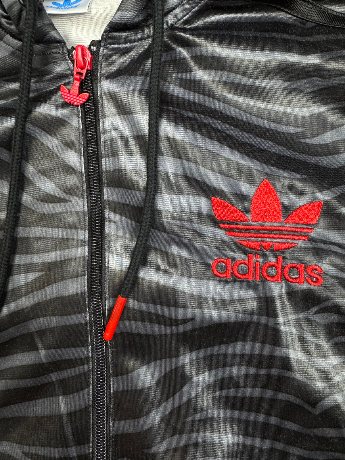 vintage Adidas firebird trackjacket wet look {XS}