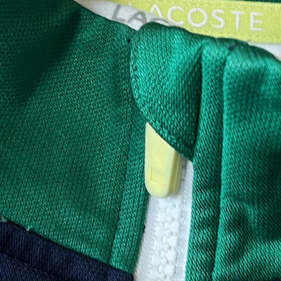 white Lacoste trackjacket {M}