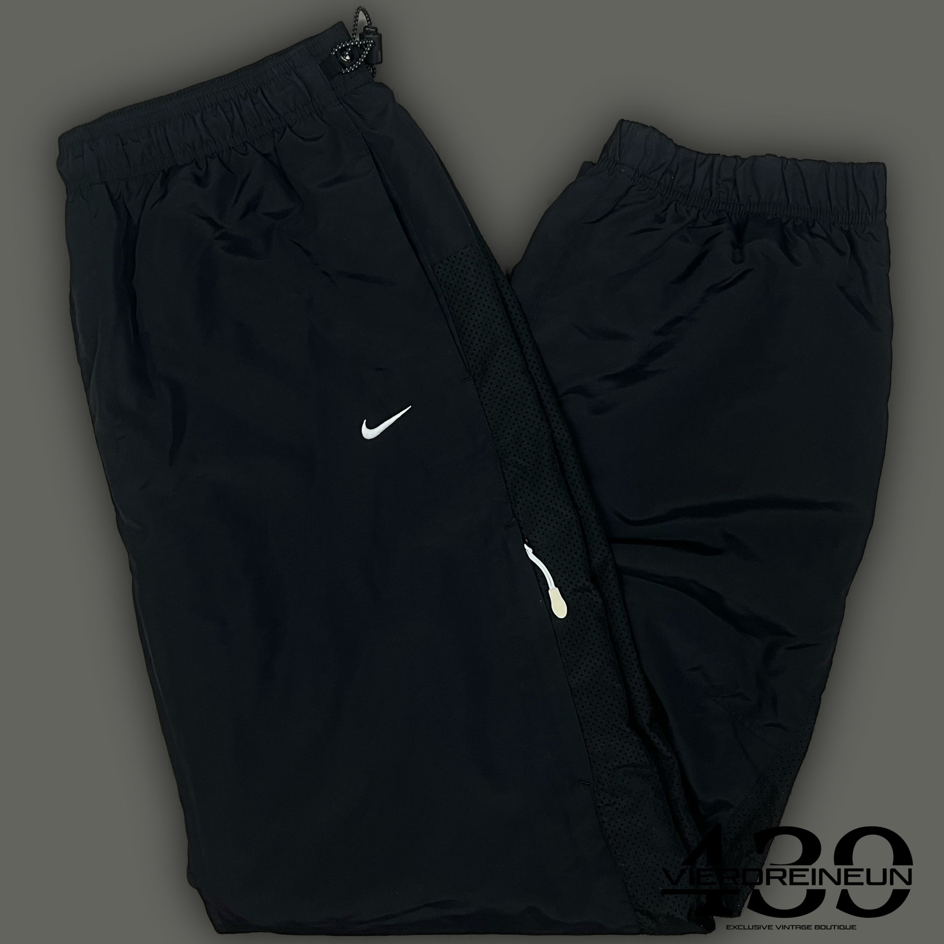 vintage Nike trackpants {L}