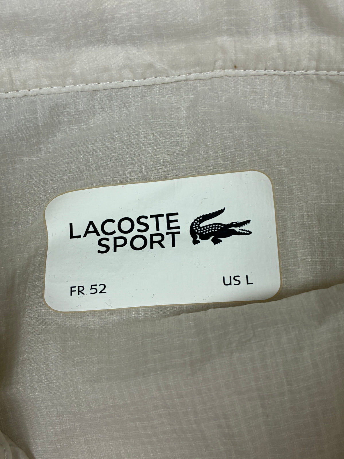 white Lacoste windbreaker {L}