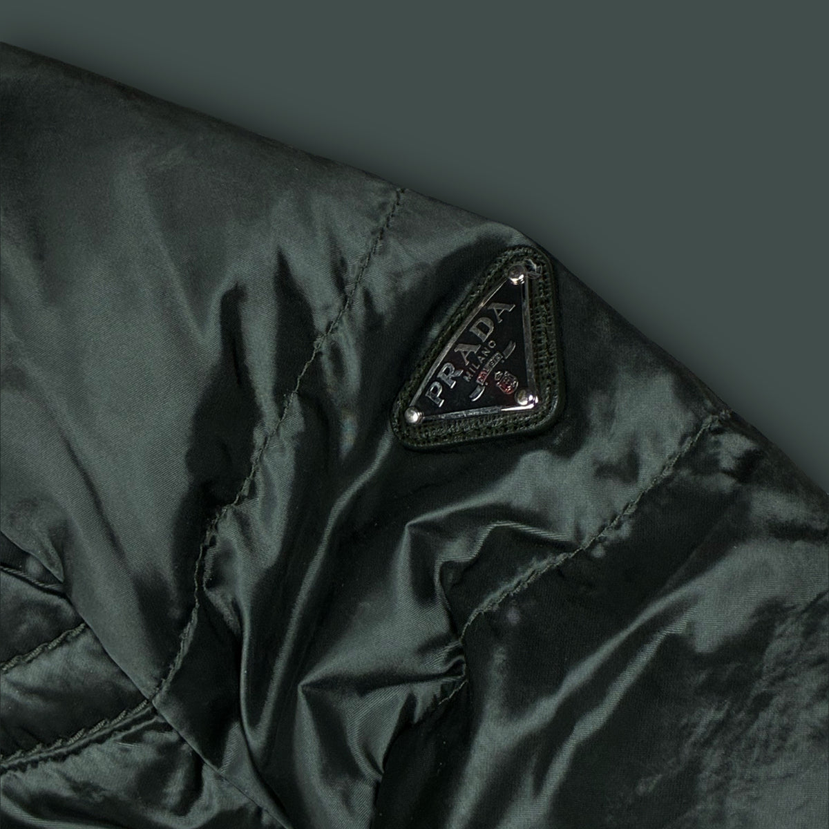 dark green Prada pufferjacket {XS}