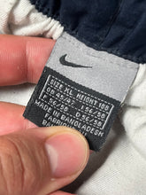 Load image into Gallery viewer, vintage Nike trackpants {XL}
