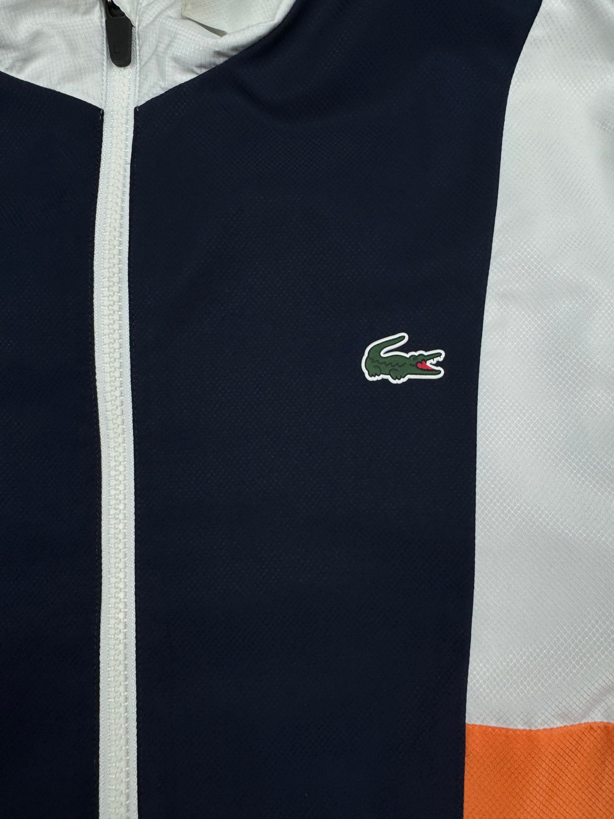 white Lacoste windbreaker {S}