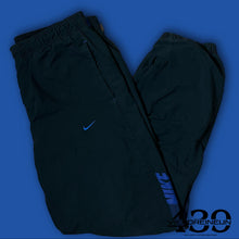 Load image into Gallery viewer, vintage Nike trackpants {M}
