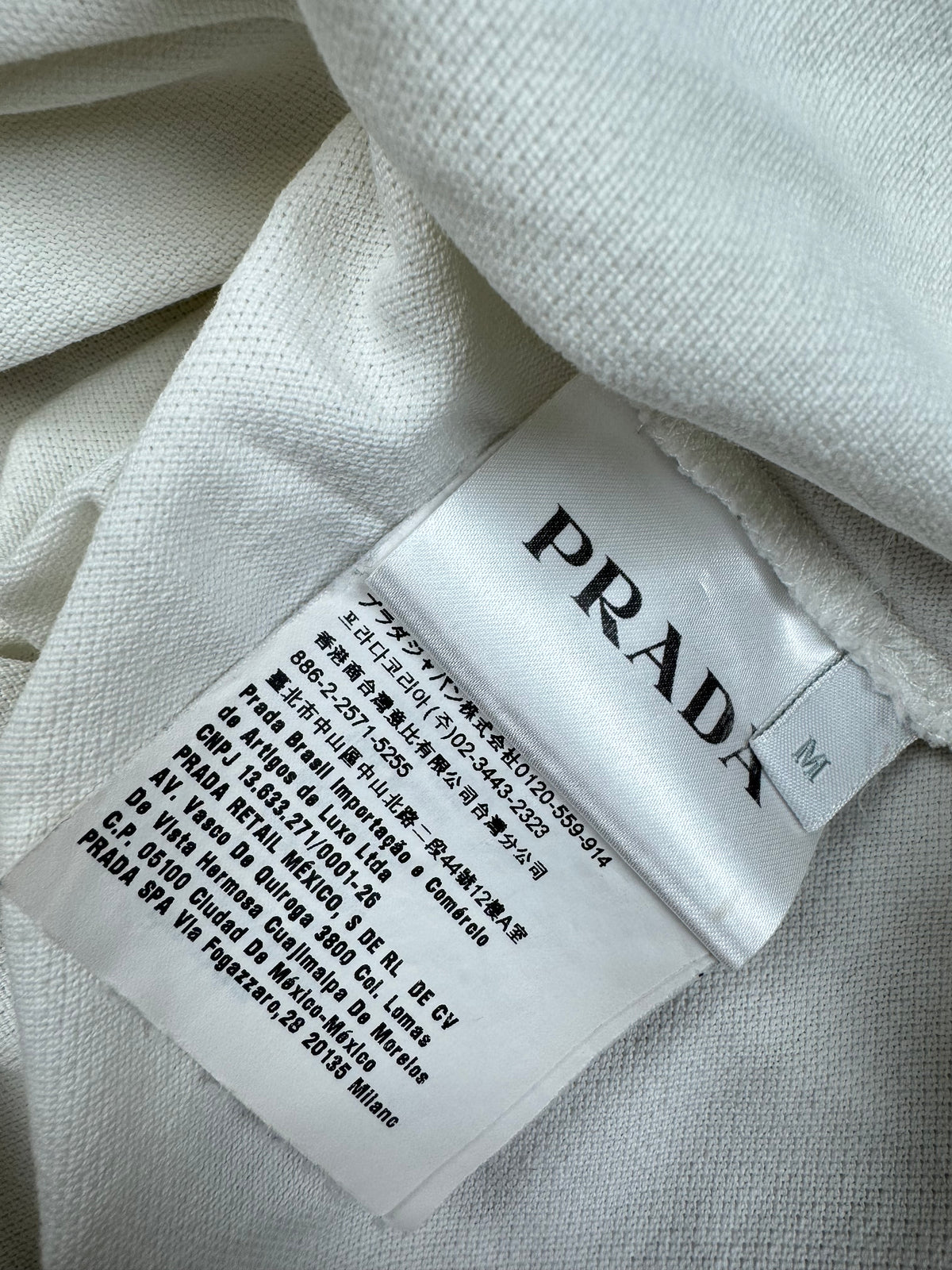 white Prada polo {M}