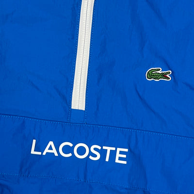 blue Lacoste halfzip windbreaker {S}