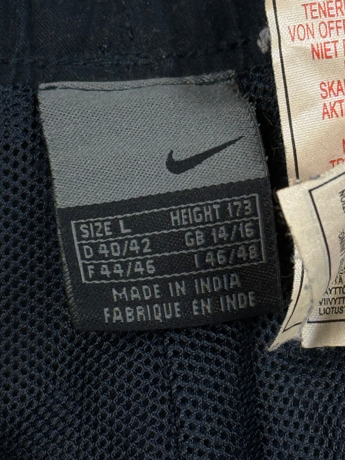 vintage Nike trackpants {S}