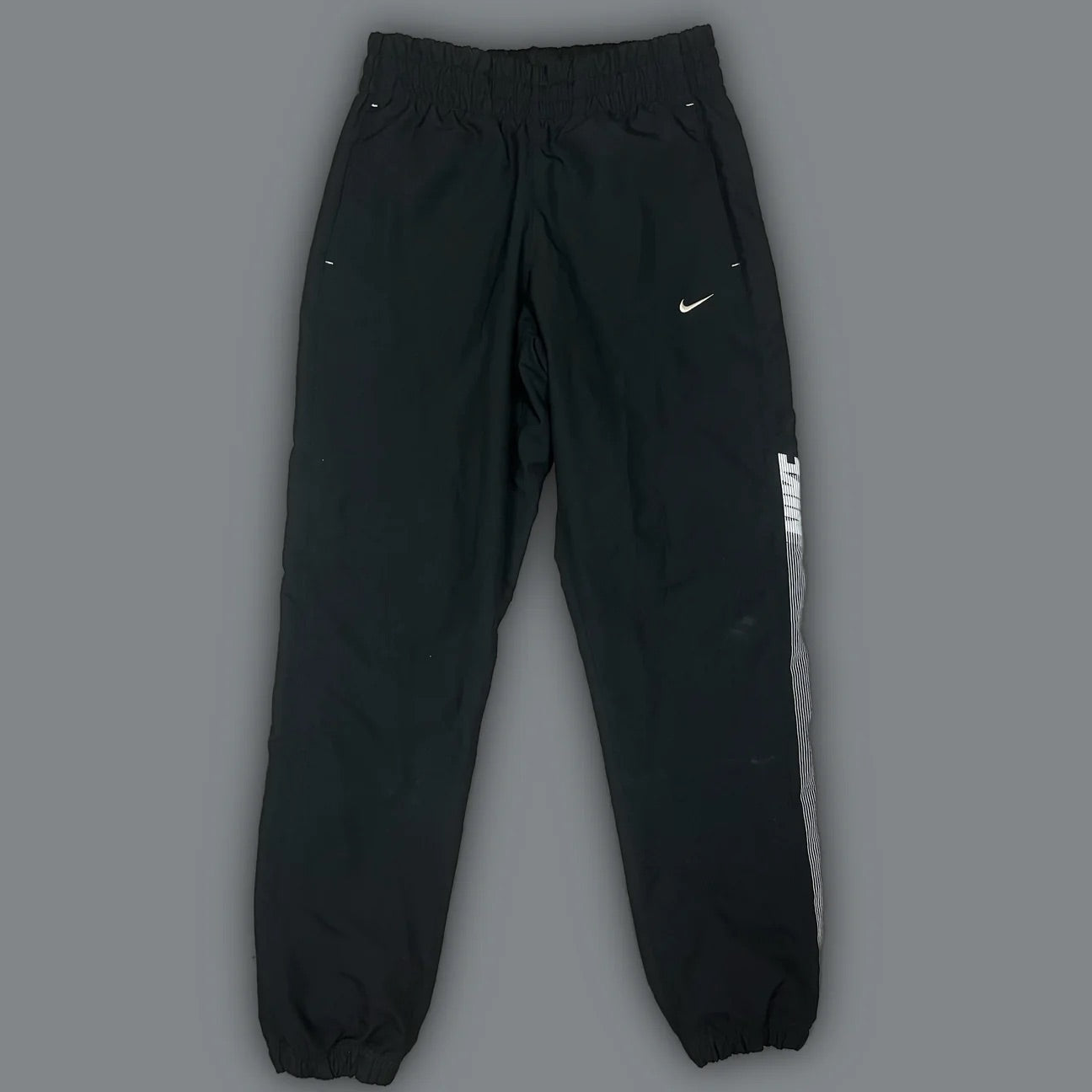 vintage Nike trackpants {M}